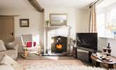 The wood-burner keeps you cosy whenever you visit. - Thumbnail Image