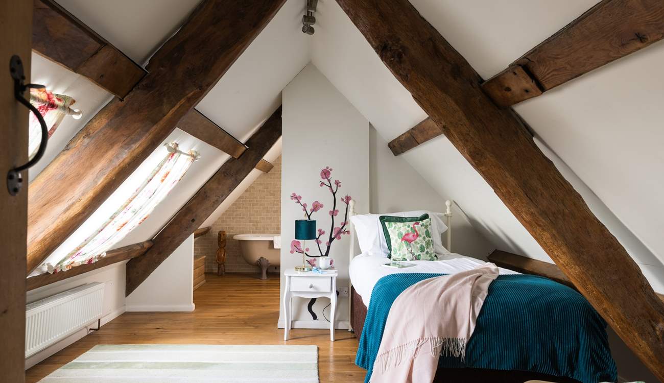 Pretty second floor single bedroom with en suite. Please note the sloping ceiling. 