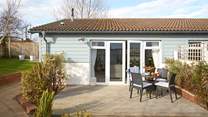 Escape Away's frontage leads to the living space, or you can enter through the side door.