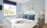 Bedroom one is beautifully presented in calm and soothing colours. - Thumbnail Image