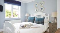 Bedroom 1 is beautifully presented in calm and soothing colours.