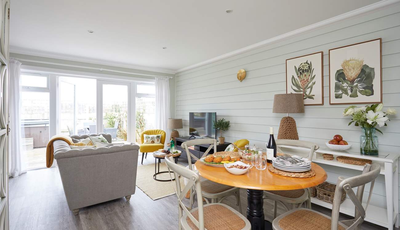 The lovely open plan living space, spot the hot tub out on the terrace.