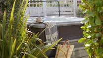 The bubbling hot tub is waiting for you at Driftwood.