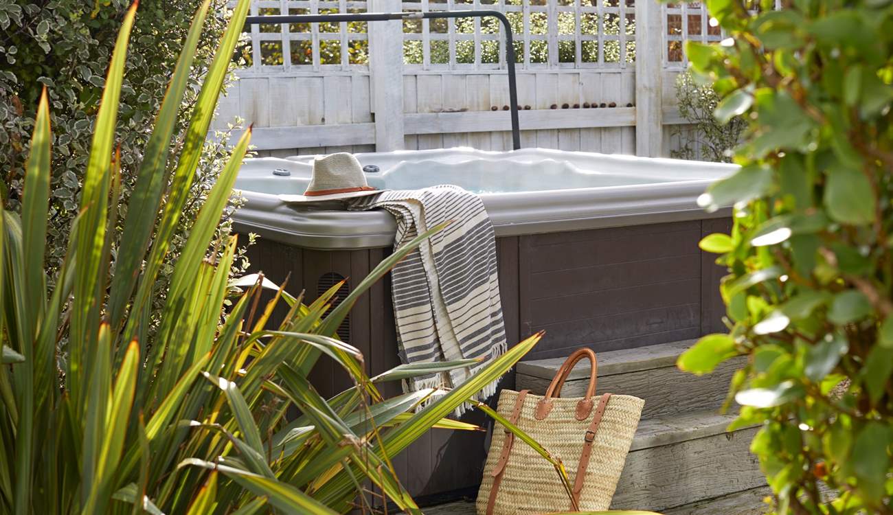 The bubbling hot tub is waiting for you at Driftwood.