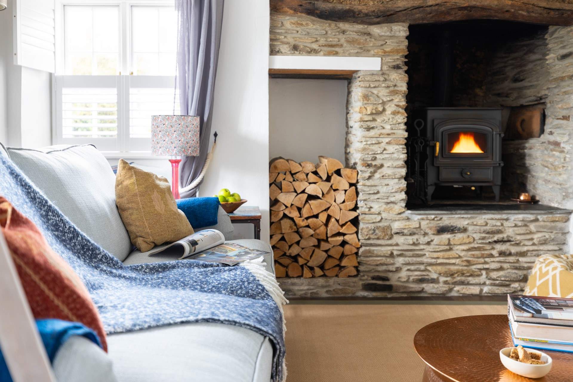 Get cosy with the wood-burner in cooler months. 