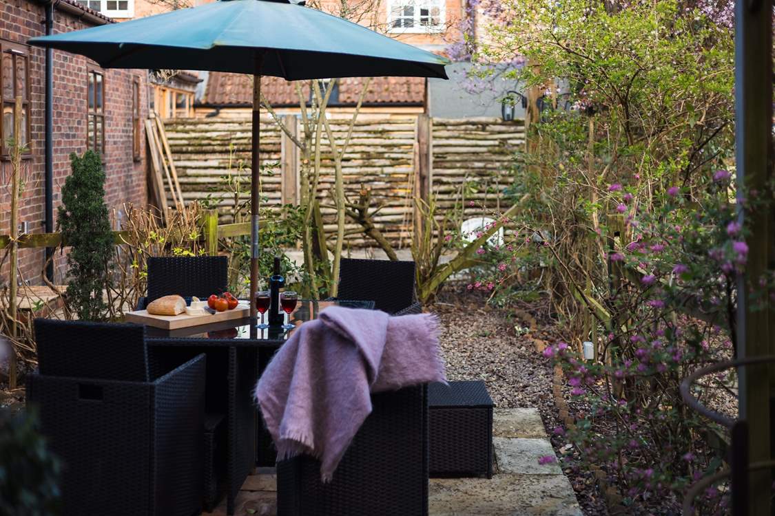 The rustic garden, just waiting for the trees to burst into bloom.