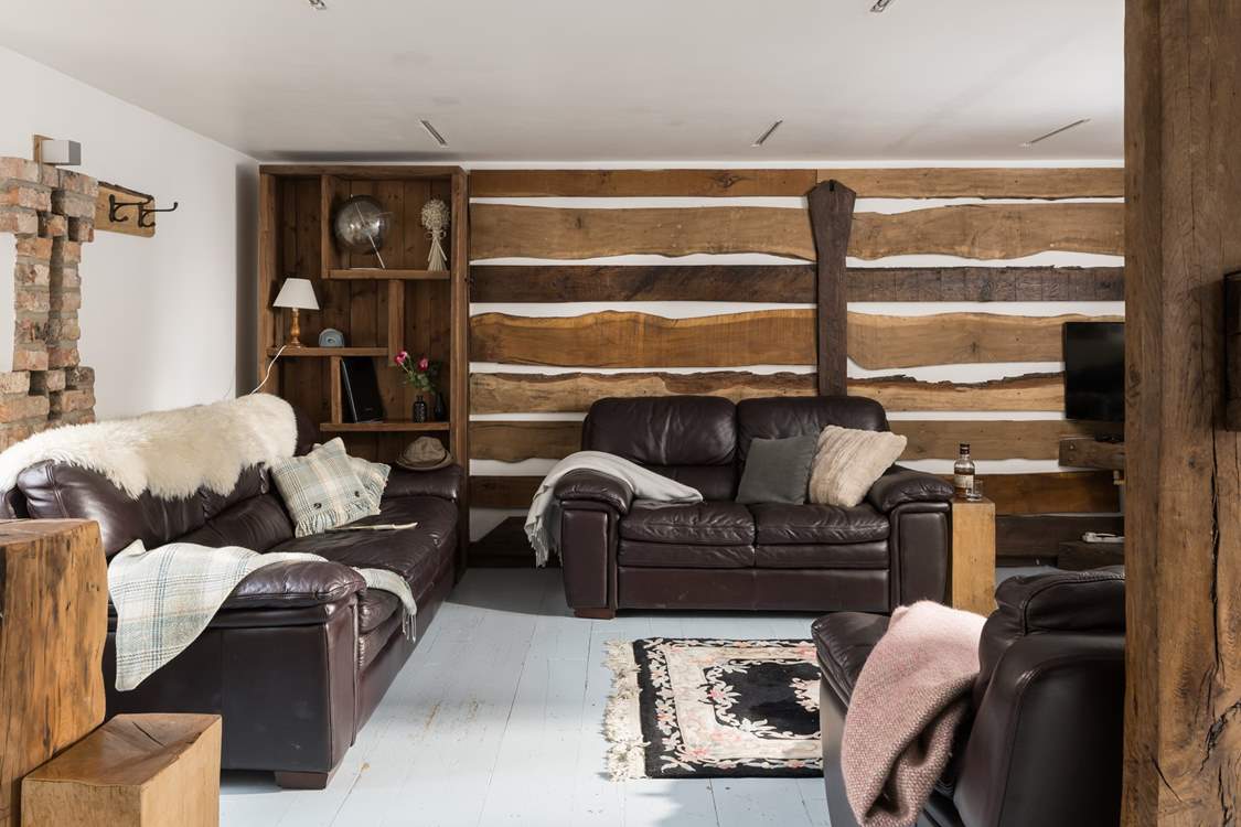 Local wood and original features style this cosy room.