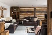 Local wood and original features style this cosy room.