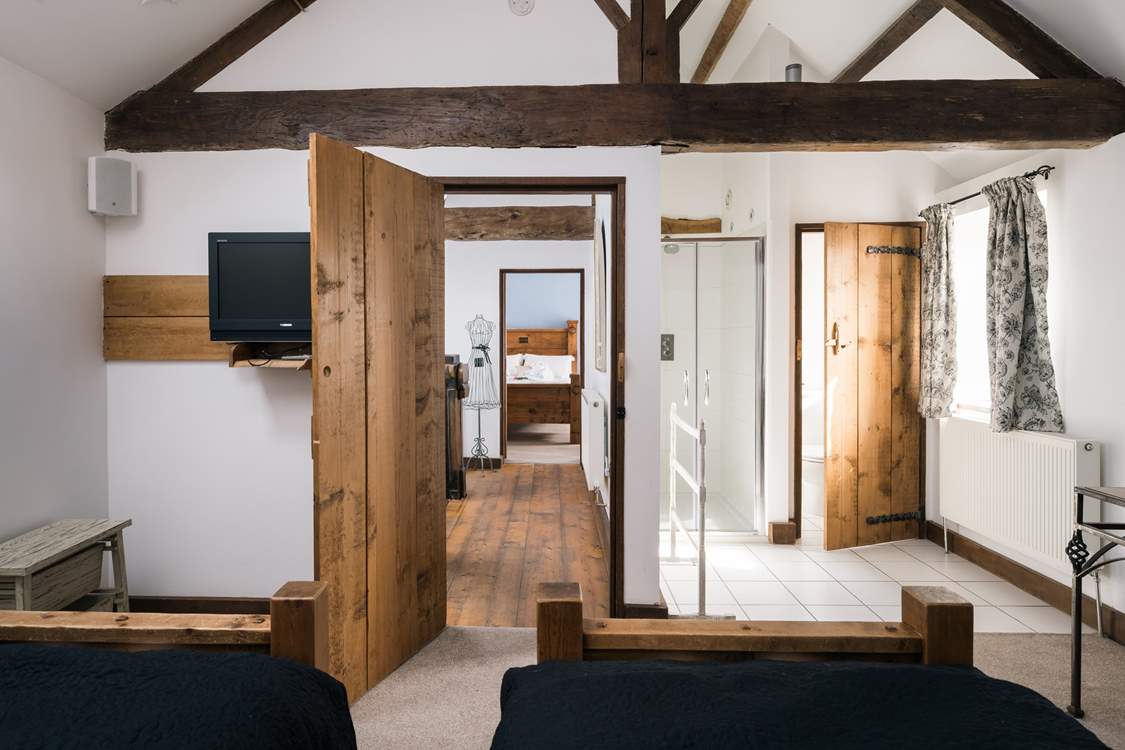 This room has it all including a shower cubicle.