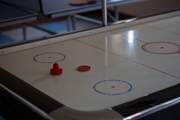 Enjoy a friendly game of air hockey.
