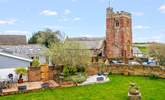 Views across the garden to the pretty church. - Thumbnail Image