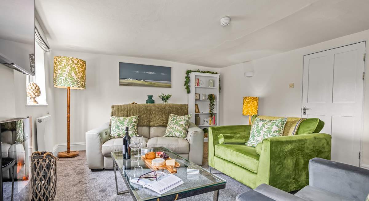 The lovely sitting-room with comfy sofas, sink in and relax.