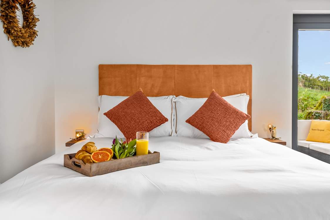 A fabulous king-size bed to sink into of an evening.