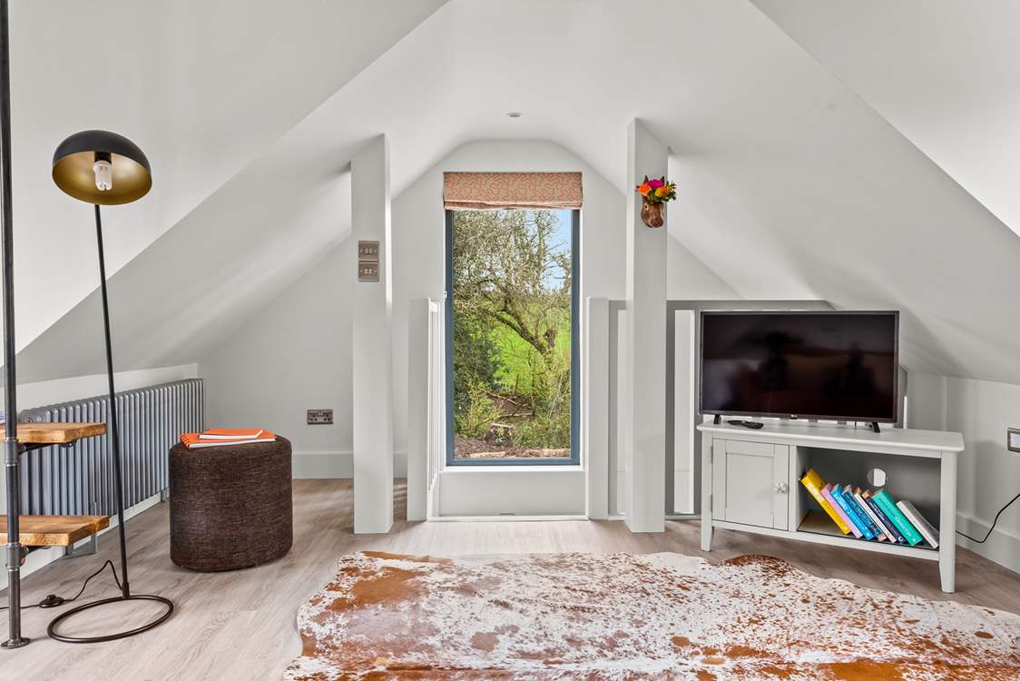 Head downstairs to the kitchen and dining area.