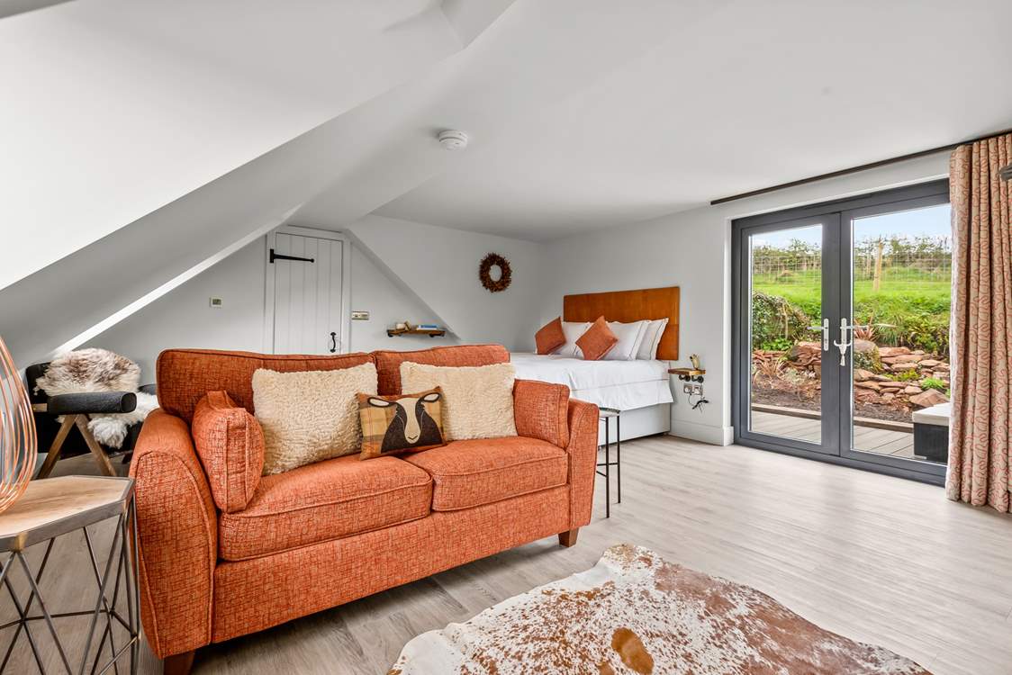 The living and sleeping area is spacious and exceptionally inviting.