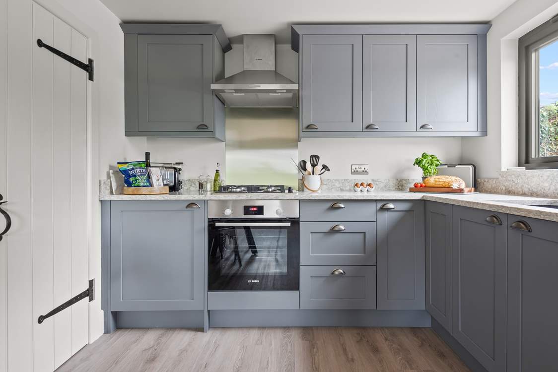 Rustle up a romantic dinner for two with ease in this contemporary kitchen.