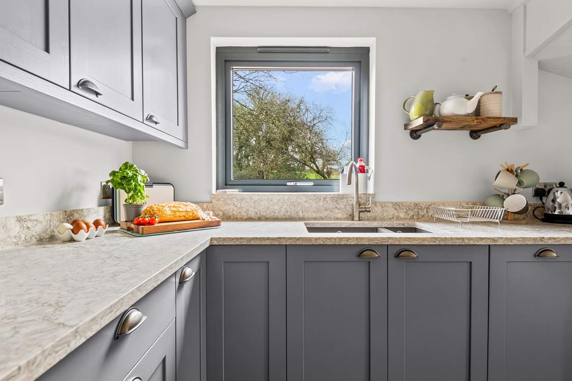 Even washing up will not be a chore with such incredible countryside views.