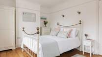 The main bedroom has a beautiful, relaxed charm.