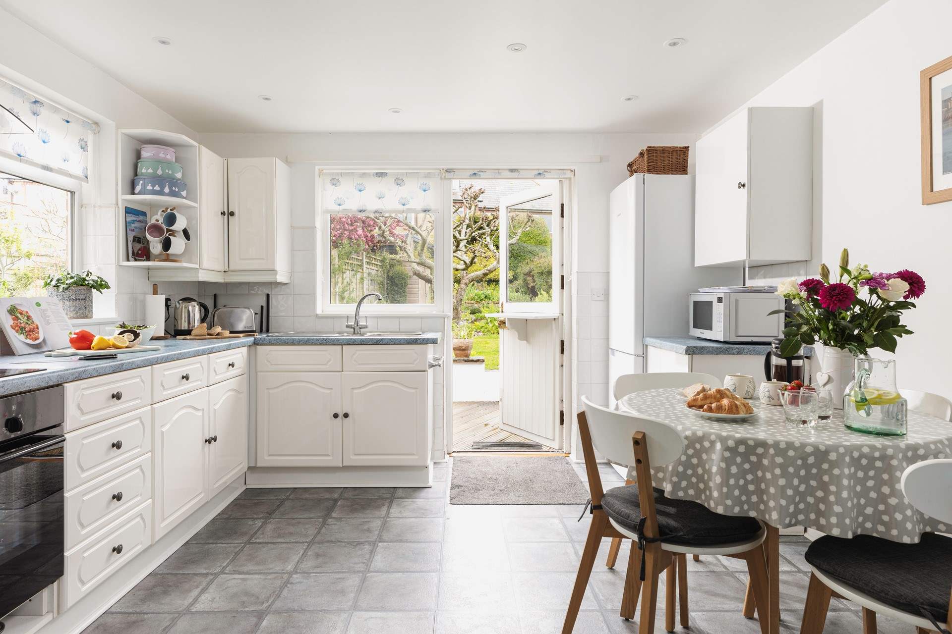 The kitchen is wonderfully light and spacious. 