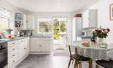 The kitchen is wonderfully light and spacious.  - Thumbnail Image