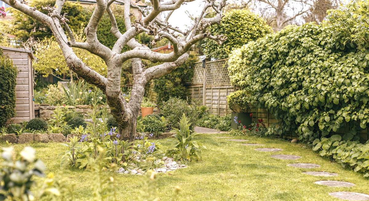 The garden was designed by a floral artist and boasts beautiful colours.