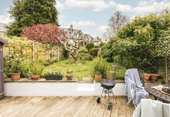 Fire up the barbecue and enjoy evenings in this picturesque garden.