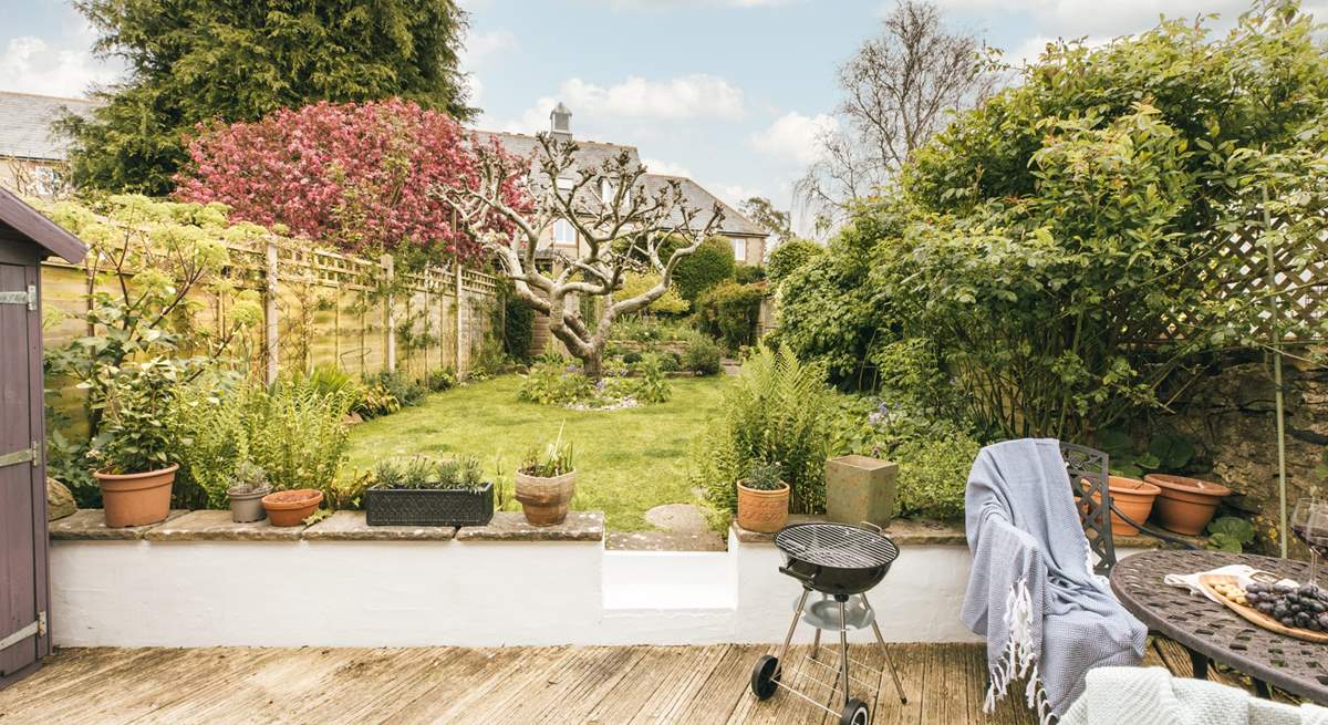 Fire up the barbecue and enjoy evenings in this picturesque garden.