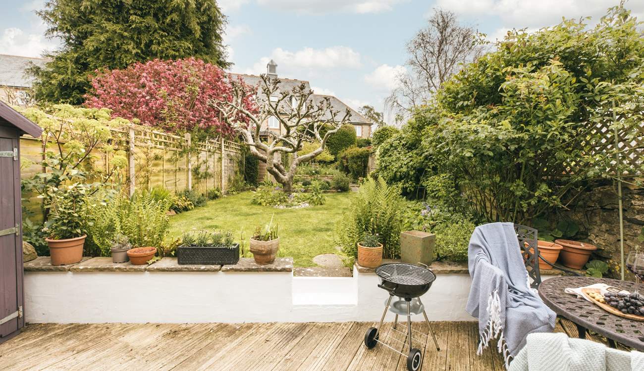 Fire up the barbecue and enjoy evenings in this picturesque garden.