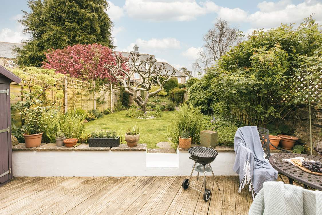 Fire up the barbecue and enjoy evenings in this picturesque garden.