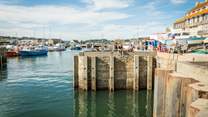 Enjoy fish and chips harbourside.