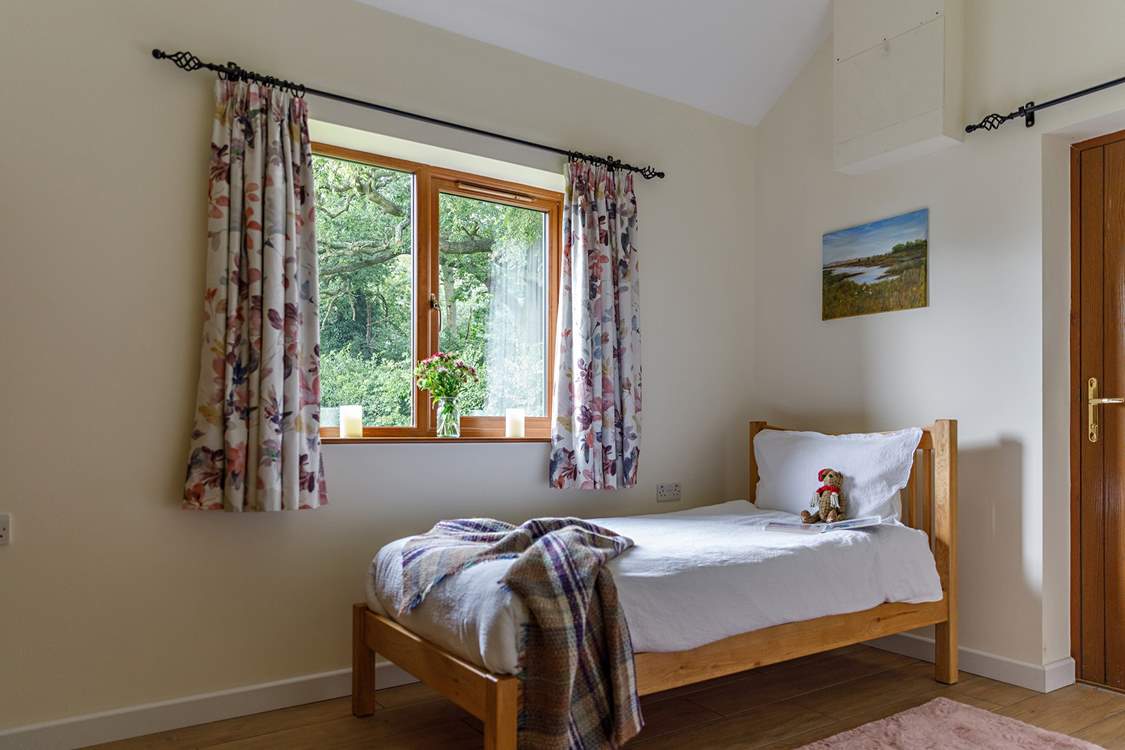 The twin room has views of the neighbouring mature gardens.