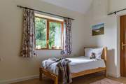The twin room has views of the neighbouring mature gardens.