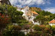 Stroll along the winding cobbled lanes of Runswick Bay.
