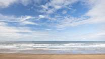 Pack your picnic and spend a day on the beach, only a few minutes' drive away.