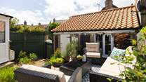 Enjoy this lovely sun-trap at Sealark.