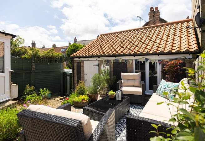 Cocktails at sundown in the courtyard patio, of course, it's a must.