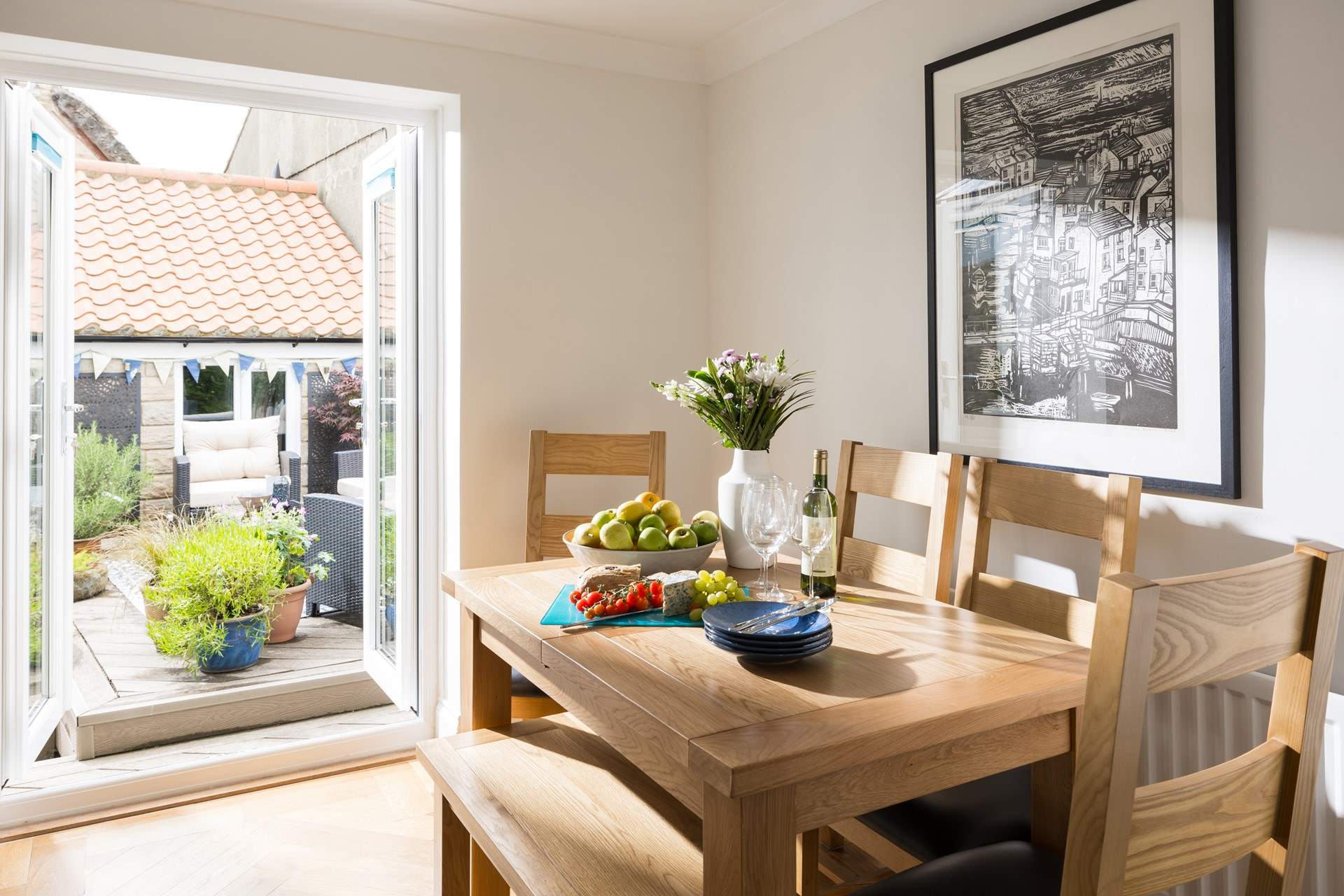 Local artwork graces the dining-area.