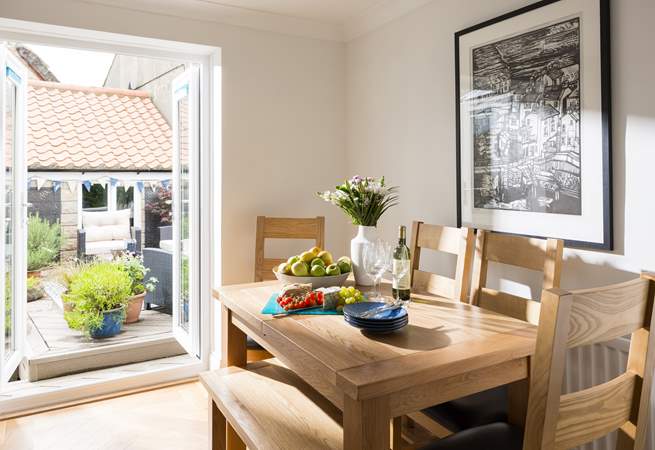 Local artwork graces the dining-area.