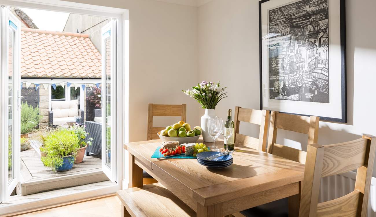 Local artwork graces the dining-area.