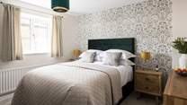 Neutral colours grace this relaxing bedroom.