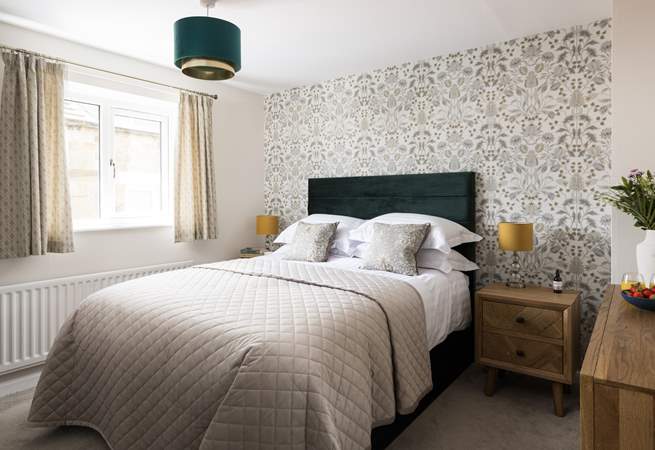 Neutral colours grace this relaxing bedroom.