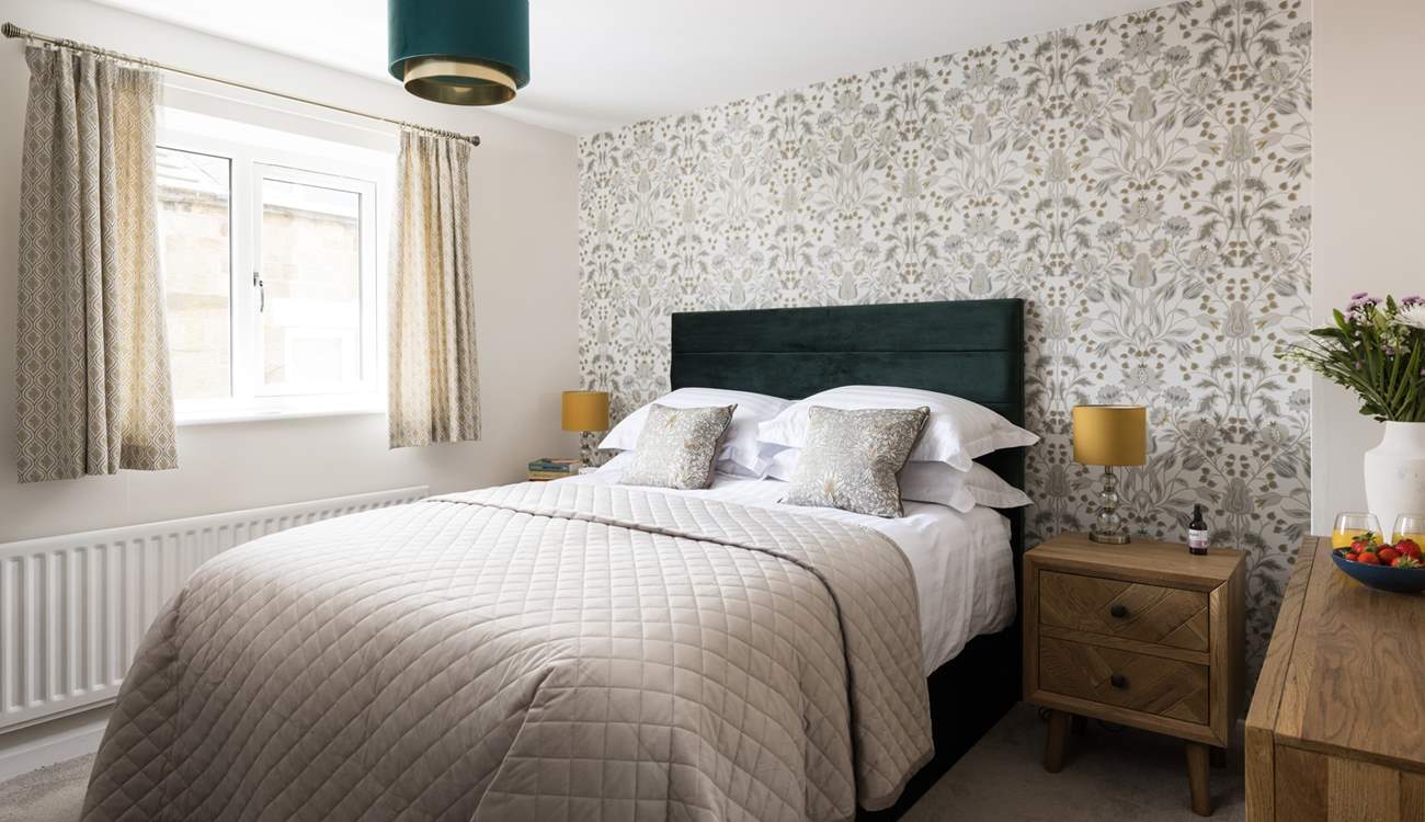 Neutral colours grace this relaxing bedroom.