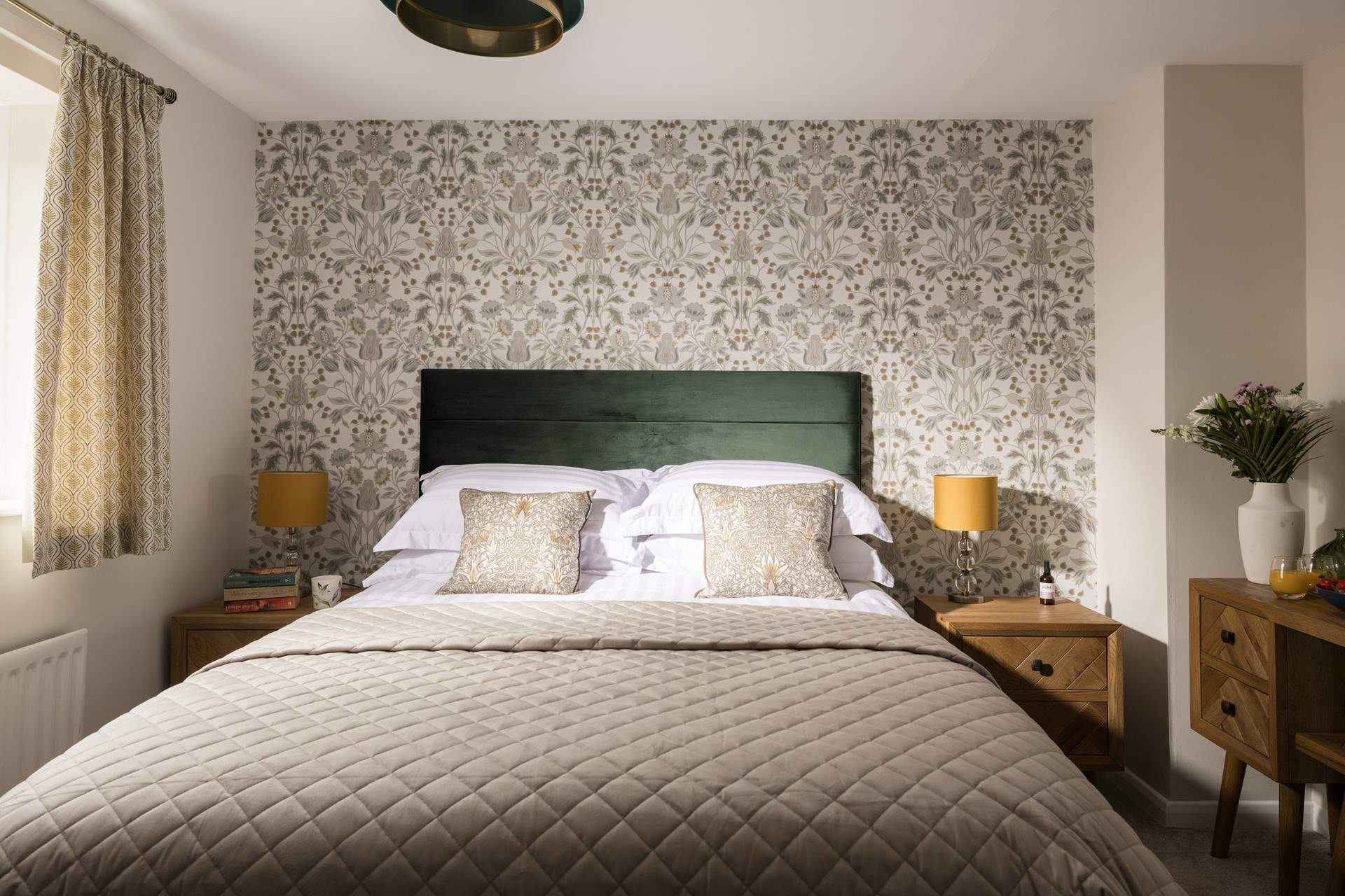 A perfect bedroom to relax in after a day at the sea.