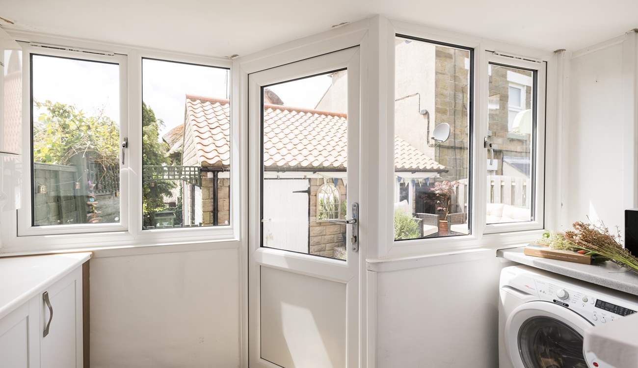 A very useful utility/boot room, perfect for sandy sandals or muddy walking boots. 