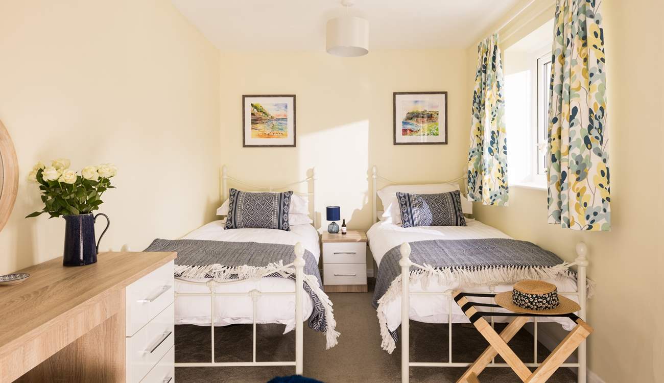 What a jolly twin bedroom.