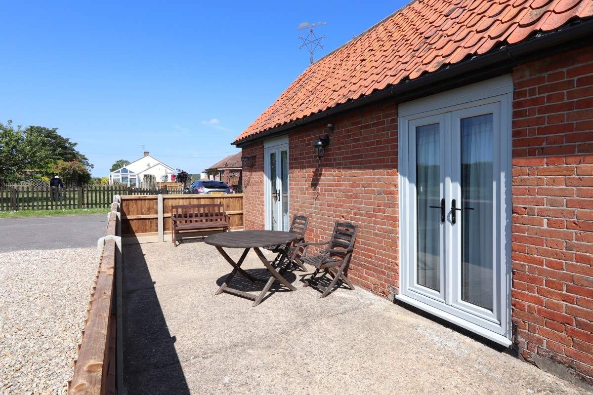 An enclosed terraced unique to Sunset Lodge with countryside views.