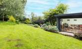 Follow the garden path from the cottage door to discover this gorgeous garden retreat! - Thumbnail Image