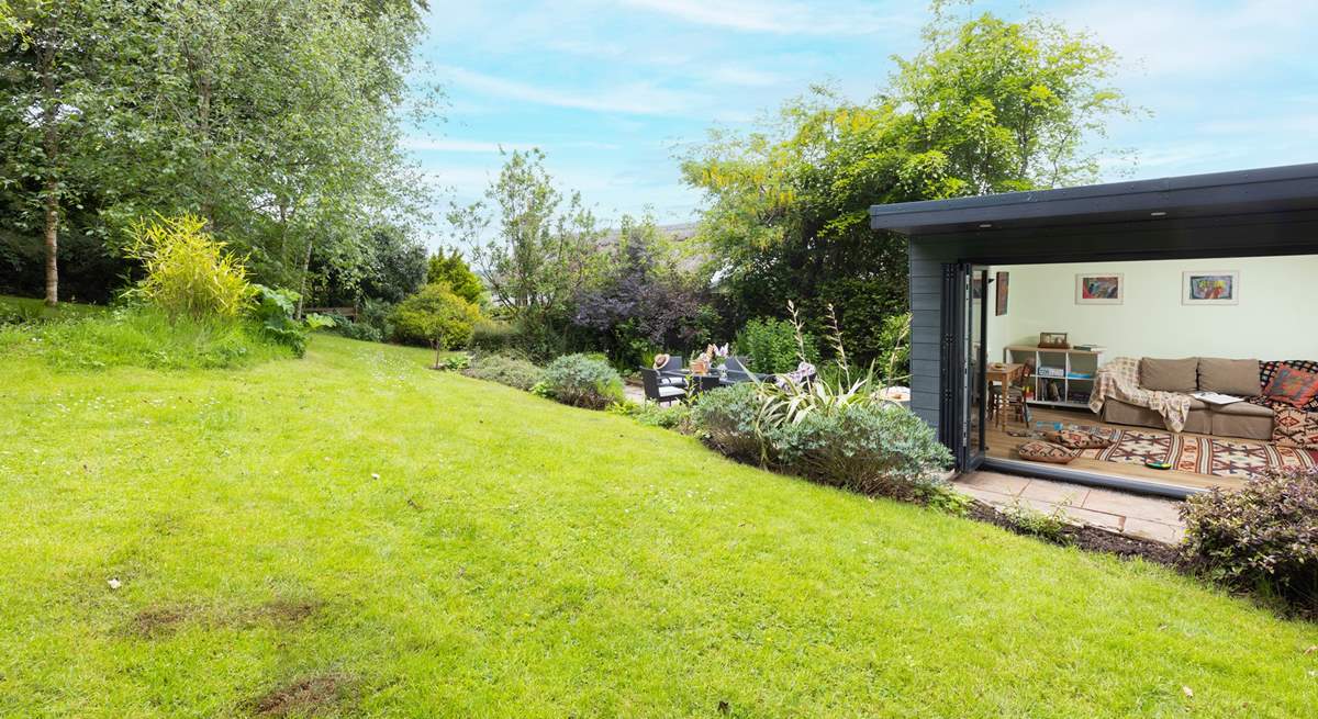 Follow the garden path from the cottage door to discover this gorgeous garden retreat!