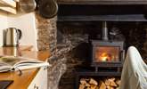 Enjoy your morning beverage by the warming wood-burner. - Thumbnail Image