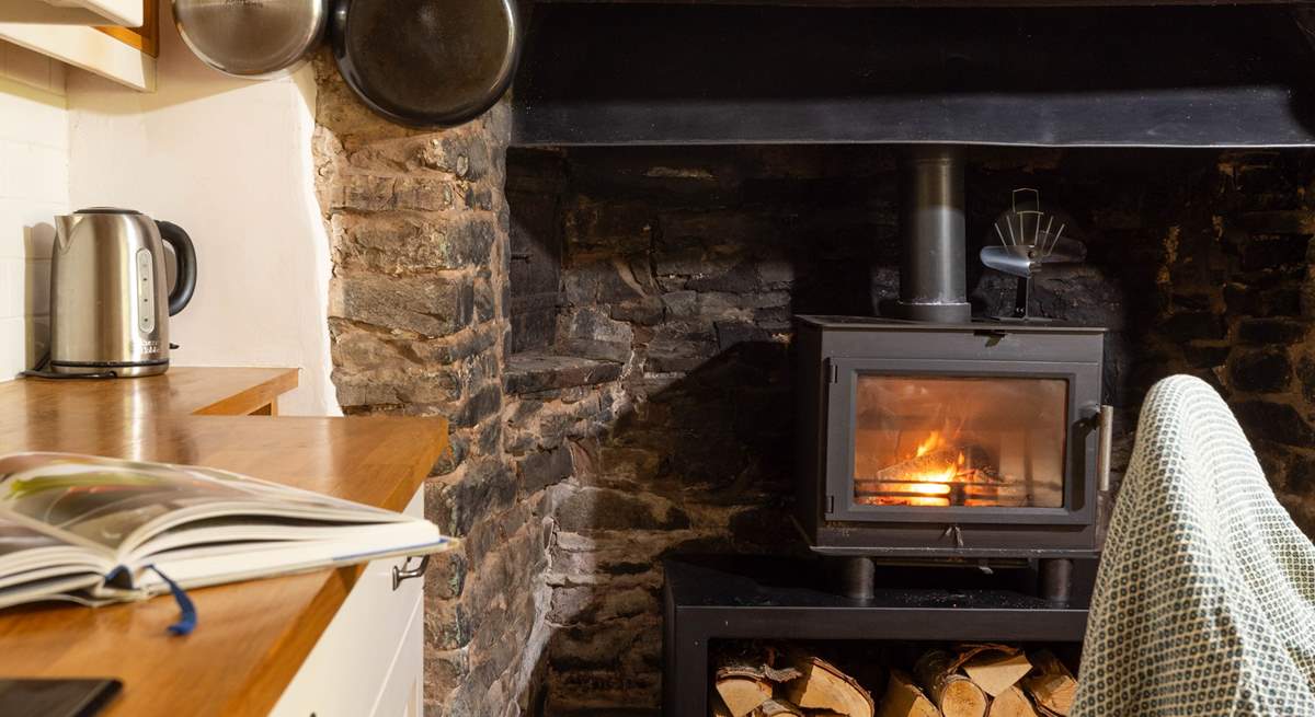 Enjoy your morning beverage by the warming wood-burner.